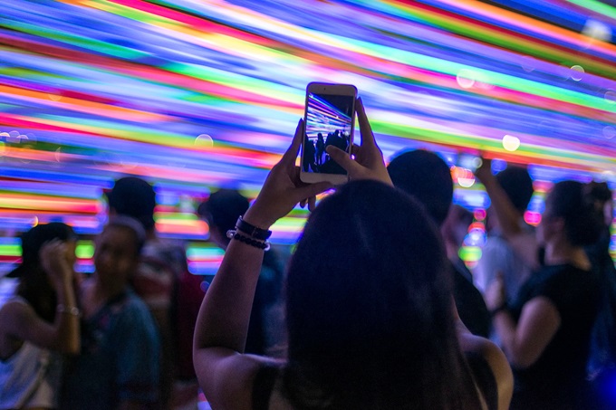 Taking photo on phone of lights